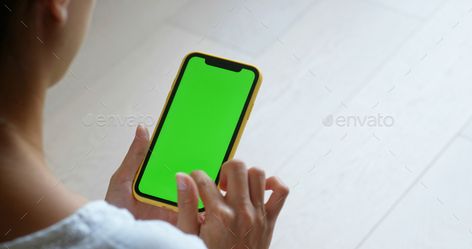 Woman use of cellphone with green screen at home by leungchopan. Woman use of cellphone with green screen at home #Sponsored #green, #cellphone, #Woman, #leungchopan Chroma Key, Green Screen, Cell Phone, At Home, Screen, Key, Green