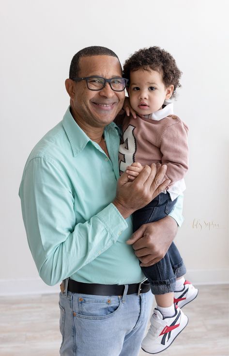 Grandpa smiles as he holds his two-year-old grandson in his arms during a Milestone Family Session by Lily Sophia Photography near the Buckhead area of Atlanta, Georgia. Bags For College, Toddler Portraits, Baby Chloe, Natural Light Studio, In His Arms, Jones Family, Autumn Park, Baby Milestone, Fields Photography