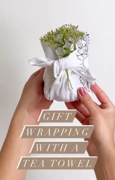 Wrap your gifts with a tea towel instead of paper! ✨Tea towels make for a great eco-friendly alternative to traditional wrapping paper. The wrapping process in this video comes from Furoshiki, a traditional Japanese wrapping cloth used to wrap goods. It’s a simple process and can be used on a variety of gift sizes and shapes. Plus I love that the wrapping is also a gift!.Our tea towels are large which make for the perfect wrapping material. Here you’ll see a candle wrapped with our Ble How To Wrap A Candle Gift, Japanese Wrapping Cloth, Japanese Wrapping, Tea Towel Gift, Candle Wrap, Wrapping Cloth, How To Wrap, Diy Wrap, Handmade Business