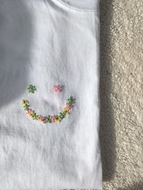 Embroidered Shirt Custom Embroidery Design Flower Smiley | Etsy Daisy Embroidery Shirt, Hand Embroidery Designs Tshirt, Embroidery Design On T-shirt, T Shirt Design Flower, Embroidery Patterns Shirt, Tshirt Pocket Embroidery, Tee Shirt Embroidery, Small Embroidery Designs On Tshirt, Embroidery Design For Tshirt