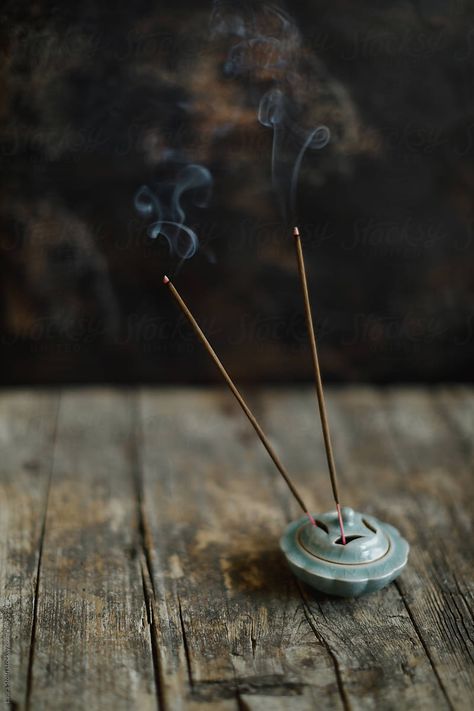 Two incense sticks burning standing in ancient china holder by Laura Stolfi for Stocksy United Incense Photography, Incense Burning, Handmade Incense, Sustainable Supply Chain, Burning Incense, Wood Sticks, Yoga Photography, Eco Design, Essential Oil Fragrance