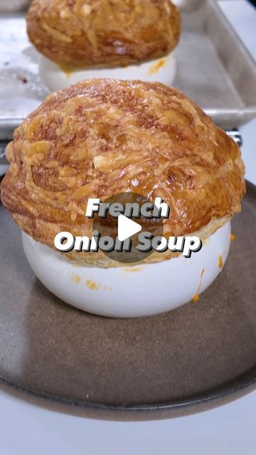 Christopher Kimball’s Milk Street on Instagram: "Is there such a thing as “light” French onion soup? The answer was in an herbaceous, brothy bowl served to @cpkimball at Bichettes (@bichettesrestaurant) in Paris. In place of an impenetrably thick layer of cheese and bread, chef Hortense Thireau topped her soup with a puff pastry lid (elegant, but easy to mimic with pre-packaged dough). And she lightened the soup itself by caramelizing the onions less aggressively, deglazing only once with white wine. Best served straight out the oven, with a crispy, crackly crust.  Get the recipe for French Onion Soup via the link in our profile, under “RECIPES” → @177milkstreet  #milkstreetrecipes #souprecipes #soup #easyrecipes #recipeoftheday #frenchonionsoup #paris" Milk Street French Onion Soup, Recipe For French Onion Soup, Soup With Puff Pastry Top, Puff Pastry Soup, French Onion Soup Puff Pastry, French Onion Soup With Puff Pastry, French Onion Soup Stove Top, Baked French Onion Soup, Milk Street Recipes Christopher Kimball