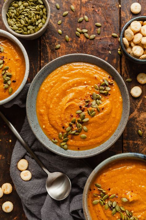 Vegan Pumpkin Bisque, Pumpkin Soup Photography Styling, Pumpkin Soup Photography, Homemade Soup Aesthetic, Pumpkin Soup Aesthetic, Pumpkin Potage, Autumn Food Photography, Soup Autumn, Vegan Pumpkin Soup Recipe