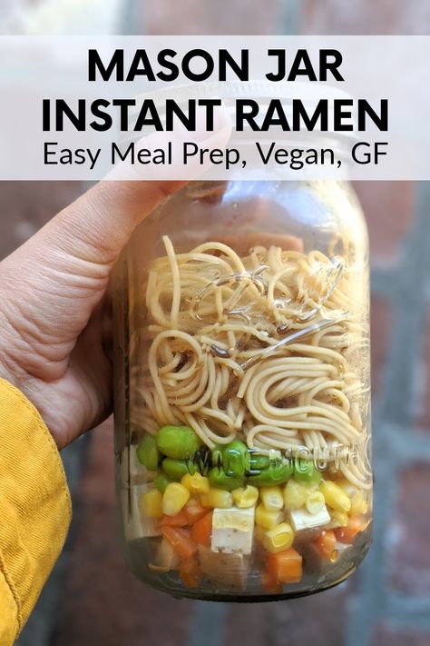 This mason jar ramen recipe is an easy and satisfying lunch!  More flavorful than Instant Ramen, this soup will fill you up with healthy vegetables without the salt.  Just add hot water, and you have a delish and filling lunch at home or at the office!This  Mason Jar Ramen Is:  Light  Filling  Low Sodium (yikes, have you ever checked out the sodium content of the packaged stuff?!)  Noodley  Vegan  Gluten Free (if using rice noodles)  Versatile – swap out any veggies.  EASY to Meal Prep Instant Ramen Meal Prep, Vegan Ramen In A Jar, Homemade Ramen In A Jar, Vegan Ramen Meal Prep, Mason Jar Instant Soup Recipes, Lunch Meal Prep Soup, Ramen Noodle Recipes Meal Prep, Vegan Meals In A Jar, Vegan Mason Jar Noodles