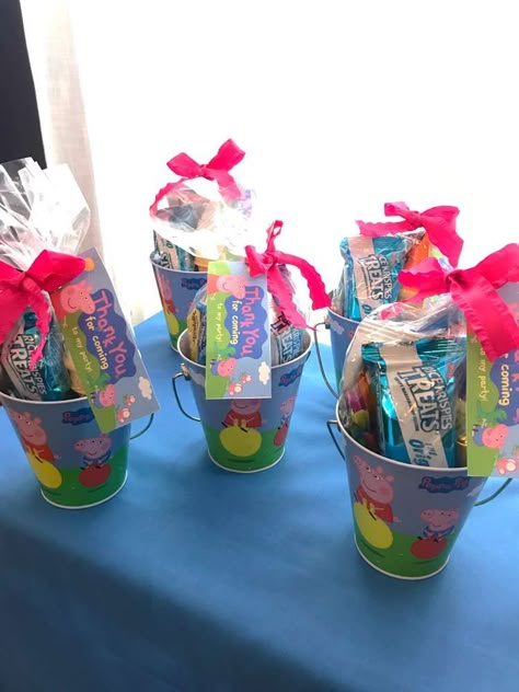 Skylar’s Peppa Pig 2nd Birthday | CatchMyParty.com Peppa Pig Pool Party, Peppa Pig Birthday Outfit Ideas, Props Pig Party, Peppa Pig Birthday Party Favors, Peppa Pig Favors, Peppa Pig Goodie Bags, Peppa Pig 5th Birthday Party, Peppa Pig Birthday Decoration Ideas, Peppa Pig Goody Bags Ideas