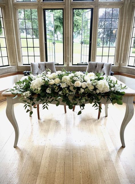 Brides Table Flowers, Mr And Mrs Table Flowers, Top Table White Flowers, White Bridal Table Flowers, White And Green Head Table Flowers, Top Table Centerpieces Wedding, White Rose Top Table Flowers, Wedding Top Table Flowers Floral Arrangements, White And Green Top Table Flowers