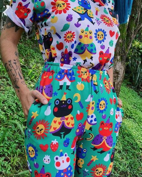 This group of frog wizards are perfect to keep you company everywhere you go 💖💖💖Made from a soft cotton blend, these joggers feature a vibrant print that won't fade.Wearing a size S, please see photos for reference and measurements. These are very fitted, so if you prefer a more loose fit or you're between sizes, I'd recommend sizing up!• 70% polyester, 27% cotton, 3% elastane• Fabric weight: 8.85 oz/yd² (300 g/m²)• Slim fit• Soft cotton-feel fabric face• Brushed fleece fabric inside• Cuffed Music Themed Outfits, Weird Fashion Aesthetic, Maximalist Style Fashion, Frog Wizard, Artsy Clothes, Bug Pants, Maximalist Fashion, Silly Clothes, Etsy Clothes