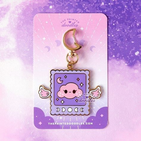 ✨Special discount on the celestial collection!✨ ☁��️Fluffy Cloudy enamel keychain💜 . . . #accessories #gift #charm #keychains #kawaii… | Instagram Keychain Packaging Design, Keychain Packaging, Kawaii Instagram, Charm Keychains, Sticker Packaging, Vendor Table, Enamel Keychain, Bg Design, Keychain Accessories