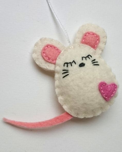 🐭🎄 Adorable Felt Mouse Ornaments - Ready to Ship! 🎄🐭 Bring a sprinkle of cuteness to your holiday decor with my charming Felt Mouse Ornaments, available now in my shop! These little mice are crafted with love and attention to detail, making them the perfect addition to your festive decorations. 🎁 Perfect Gift: Ideal for mouse lovers and anyone who appreciates handcrafted ornaments, these felt mice make thoughtful and unique gifts. 🌟 Handmade Quality: Each ornament is made from high-quality... Felt Mouse Pattern Free, Disney Felt Ornaments, Felt Ballerina, Felt Patterns Free, Mouse Ornaments, Felt Mice, Diy Felt Christmas Ornaments, Felt Ornaments Patterns, White Mouse