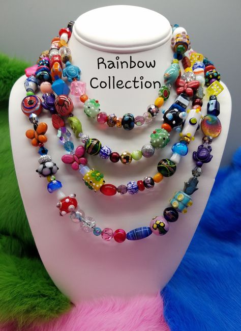 "Product Details: \"RAINBOW COLLECTION\" ...Bohemian style...Hippie style...Fancy & Fun!! * Price is for ONE STRAND, but you may buy as many as you would like. * Every necklace is a ONE OF A KIND! These Rainbow Necklaces are Priced according to the Larger Size of Lamp Work Beads that are used.  Each necklace will vary, ONES PICTURED ARE IDEAS. Each one will be similar in style to the ones pictured. These are very colorful and contain Larger Lamp work beads! If you're not looking for Larger Lamp Pride Necklace, Lampwork Necklace, Colored Necklace, Beaded Necklace Diy, Rainbow Jewelry, Rainbow Necklace, Rainbow Glass, Long Beaded Necklace, Festival Jewelry