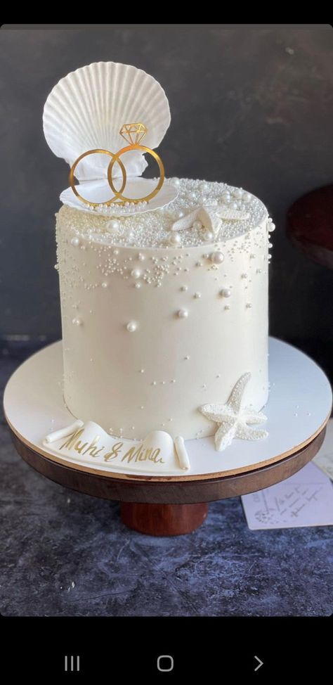 Wedding Cakes Beach Theme, Beachy Wedding Cake, Simple Beach Wedding Cake, Beach Wedding Dessert Table, Engagement Cake Ideas Elegant, Engagement Theme Cake, Wedding Cake Beach, Beach Wedding Cakes, Coastal Wedding Cake