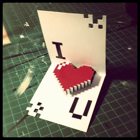 POP up Pixel heart.  Go here for the template. http://www.minieco.co.uk/valentines-day-pixely-popup-card/ Pop Up Card Valentine, Kirigami Patterns, Heart Pop Up Card, Pinterest Valentines, Diy Pop Up Cards, Pop Up Card Templates, Pixel Heart, Window Cards, Valentines Printables Free