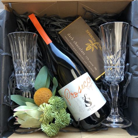 Gift Box With Wine And Chocolate, Champagne Glasses Gift Box Ideas, Champagne Gift Box Ideas, See Saw, Homemade Gift Baskets, Champagne Gift, Shop Displays, Real Estate Gifts, Gift Packages