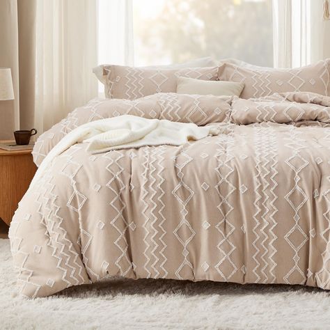 PRICES MAY VARY. Elegant Design: This boho comforter set effortlessly and stylishly refreshes your bedroom with its timeless geometric tufted embroidery design. It also features a subtle dual-color noise effect, achieved through the cationic dyeing technique. Premium Filling: Featuring Bedsure's thoroughly tested polyester microfiber filling blend, these bedding comforter sets maintain the perfect balance between weight and warmth, creating a cloud-like sleeping space all year round. Extra Soft: Tufted Embroidery, Tufted Comforter, Shabby Chic Embroidery, Comforter Sets Boho, Chic Embroidery, Boho Comforters, Bedding Comforter, Dorm Inspo, Pattern Comforter