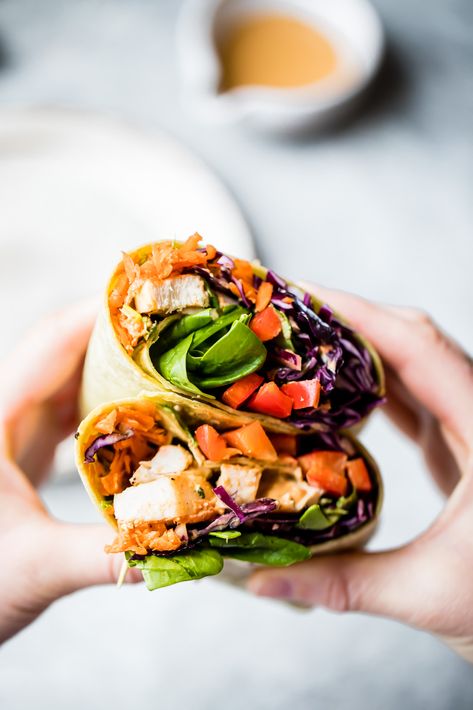 Bright, fresh crunchy rainbow Thai peanut chicken wraps packed with veggies like red cabbage, carrot, spinach and red bell pepper. These easy Thai peanut chicken wraps are protein-packed and have a delicious, flavorful peanut dressing for drizzling and dipping. The perfect lunch that's easily made vegetarian or vegan! #lunch #wrap #chicken #mealprep #healthylunch #dairyfree Peanut Wrap, Lunch Ideas High Protein, Thai Peanut Chicken Wrap, Quick Lunch Ideas, Thai Peanut Chicken, Lunch Prep, Chicken Lunch, Protein Lunch, Ambitious Kitchen