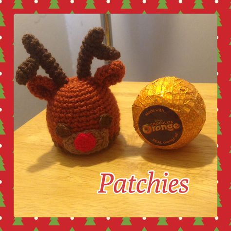 Rudolph chocolate orange cover.  #Rudolph #crochet #Christmas #chocolate #Orange  #cover Crochet Christmas Chocolate Orange Cover, Chocolate Orange Covers Crochet Free, Crochet Chocolate Orange Cover, Crochet Chocolate, Reindeer Crochet, Addi Knitting Machine, Christmas Knitting Patterns Free, Crochet Christmas Decorations, Christmas Knitting Patterns