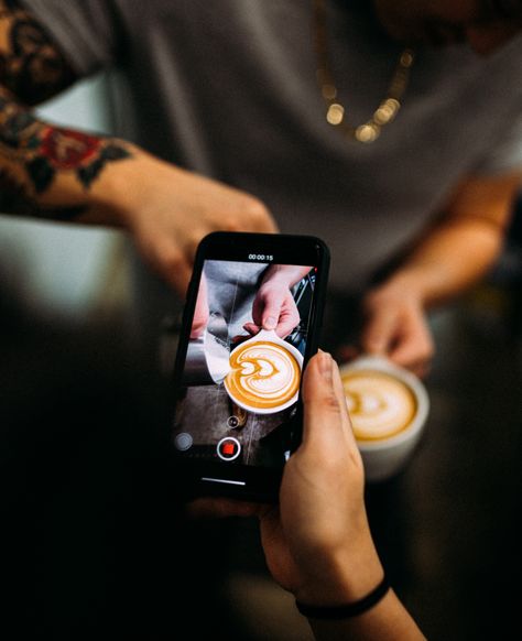 It takes a team. Tattoos and tulip latte art through the phone. Sons Of Liberty, Coffee Photo, Coffee Shop Branding, Coffee Shop Photography, Coffee Shot, Food Photoshoot, Shop Photography, Dessert Photography, Coffee Barista