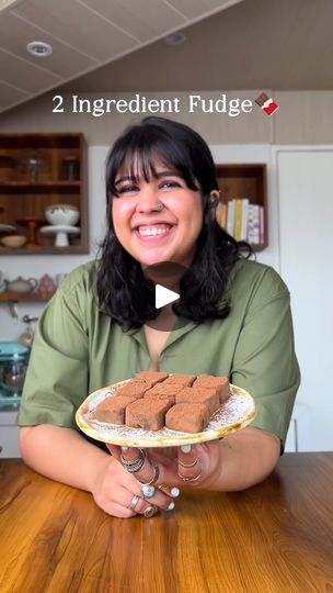 80K views · 1.1K reactions | It takes 2 INGREDIENTS to make this addictive Fudge 🤯😍 This is one of my favourite quick and easy recipes. It's so delicious, creamy and luscious!! 

Here's how you can make this recipe at home ☺️

Ingredients: 
 •Condensed milk-200 gms 
 •Cocoa powder-140 gms

Process:
- Add the condensed milk to a non-stick and heat it up on a low heat
- Once the condensed milk starts simmering,remove it from the heat 
- Sieve the cocoa powder in it part by part and fold in the mixture 
- Transfer it into a greased tin lined with plastic wrap , make sure the plastic wrap is also greased 
- Fridge it for 4 hours or overnight 
- Dust some cocoa powder on the base before de moulding the fudge and also some on the top
- Cut it into squares with a hot knife 
- Shape them as per 2 Ingredient Fudge, Knife Shapes, Candy Sprinkles, Quick And Easy Recipes, Coffee Powder, Chocolate Syrup, Looks Yummy, No Bake Treats, Plastic Wrap