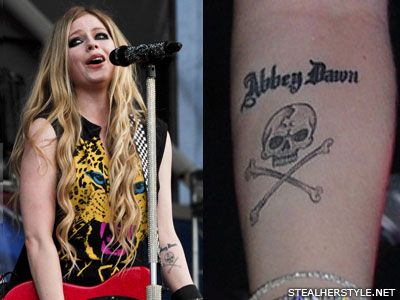 Avril Lavigne Crossbones, Skull Forearm Tattoo | Steal Her Style Avril Lavigne Now, Avril Lavigne Tattoo, Tattoo Bein Frau, Blitz Tattoo, Many Tattoos, Tattoo Mistakes, Lightning Bolt Tattoo, Husband Tattoo, Small Star Tattoos