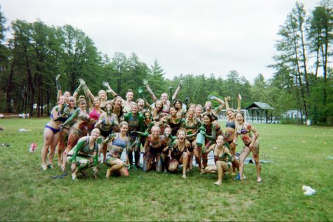 Image is of a large group of about 30 girls in a sports field. They are all wearing bikinis and are covered in paint. The picture has been taken on film. Ymca Summer Camp, Ymca Aesthetic, 80s Summer Camp Aesthetic, Sleepaway Camp Aesthetic, Summer Camp Usa, Camp Counselor Aesthetic, Summer Camp Vibes, Overnight Summer Camp, Summer Camp Aesthetic