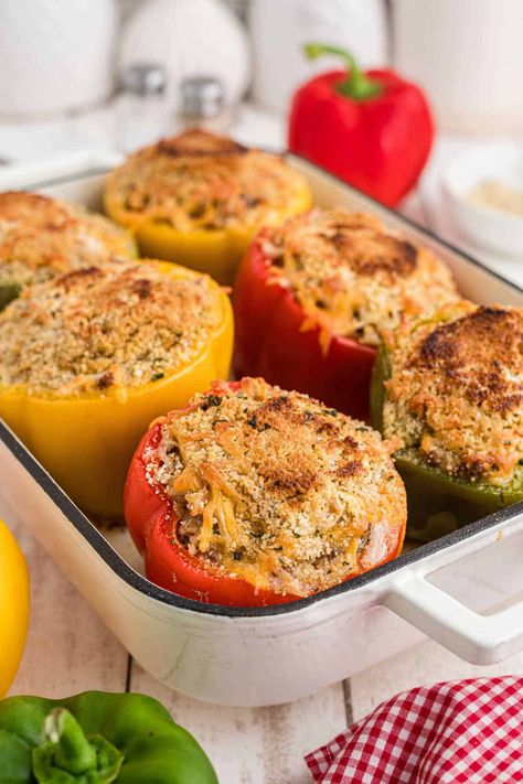 A baking dish with stuffed bell peppers, topped with breadcrumbs. Stuffed Bell Peppers With Bread Crumbs, Low Sodium Soup, Poppers Recipe, Ground Italian Sausage, Bell Pepper Recipes, Recipe Steps, Crockpot Recipes Slow Cooker, Seasoning Recipes, Cooking Meat