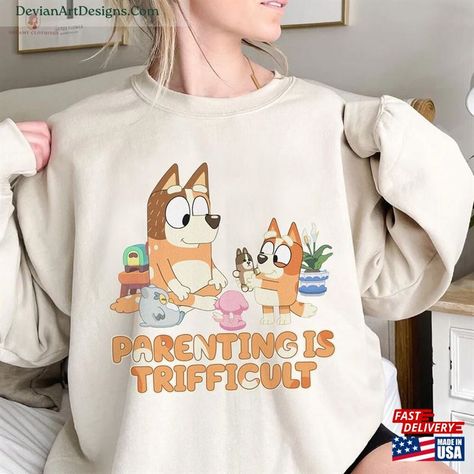 Bluey Parenting Is Trifficult Shirt Cool Mom Club Chilli Heeler Unisex Sweatshirt Check more at https://devianartdesigns.com/product/bluey-parenting-is-trifficult-shirt-cool-mom-club-chilli-heeler-unisex-sweatshirt/ Chilli Heeler, Bluey Mom, Bingo Funny, Cool Mom, Moms Club, Retro Look, Best Mom, Mom Shirts, Piece Of Clothing