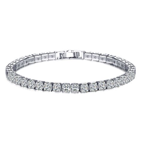 Looking for some extra arm candy? Our Brilliant Eve tennis bracelet features clear .25CT. Eq. round CZ stones that don't stop sparkling! It dresses up any outfit and its modest size can even be worn for an everyday look. Measurements: Bracelet Length: 16.5mmClasp: 25mm Hip Hop Fashion Women's, Hip Hop Mode, Mens Chain Bracelet, Bracelet Tennis, Cubic Zirconia Bracelet, Gold Girl, Hip Hop Jewelry, Silver Rhinestone, Metal Bracelets