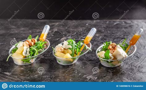 Modern European Appetizer. Mini Salad with Gorgonzola, Pear and Roasted Cashews. Orange Dressing in Sauceboat, Capsule, Pipette. Stock Photo - Image of cater, dinner: 140098616 Sushi Station, Mini Salad, Orange Dressing, Salad Buffet, Roasted Cashews, Food Stations, Pipettes, Modern European, Dessert Bars