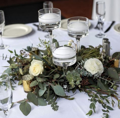 Greenery floating candles centerpiece and white flowers Floating Candles Centerpiece, Diy Greenery, Floating Candle Centerpieces, Floating Candle, Candle Rings, Candle Centerpieces, Floating Candles, Wedding Centerpieces, White Flowers