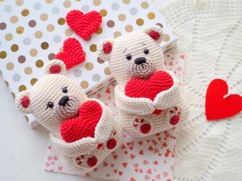 Crochet teddy bears hugging Valentine's hearts