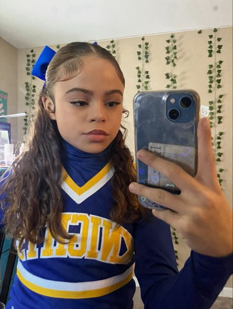 Cheerleading Hairstyles Curly Hair, Curly Hairstyles For Cheerleaders, Curly Hair Cheerleader, Cheer Half Up Half Down Hair With Bow, Half Up Half Down Hair Cheerleading, Basketball Cheer Hairstyles, Drill Team Hairstyles, Hairstyles With Cheer Bows, Half Up Half Down Cheer Hair Bows