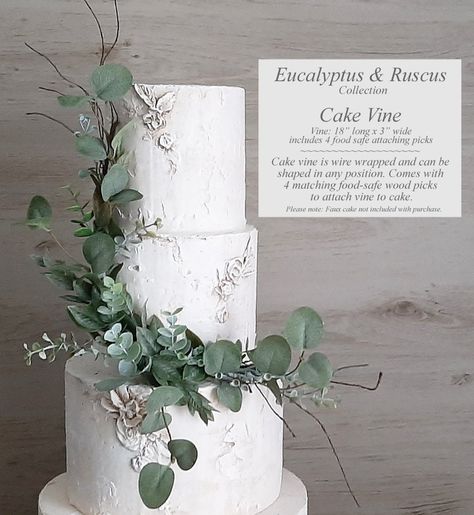 Eucalyptus & Italian Ruscus Collection, Farmhouse Wedding, Bridal Bouquet, Bridesmaid, Toss, Boutonniere, Cake Vine 🎕 About: Inspired by Eucalyptus Farmhouse Weddings. A soft mix of artificial spiral eucalyptus, seeded eucalyptus, silver dollar eucalyptus, and Italian ruscus. 🎕 Wedding colors featured: Soft muted blue green greenery. 🎕 Measurements: Please see pictures for measurements 🎕 Delivery time : Please see the announcement at the top of our shop's home page for our current lead time, Cascade Eucalyptus Bouquet, Simple Wedding Cake With Eucalyptus, Eucalyptus Bridal Shower Cake, Spiral Eucalyptus Bouquet, Eucalyptus Cake Decor, Eucalyptus Wedding Color Scheme, Eucalyptus Wedding Arch, Ruscus Wedding, Wedding Cake Eucalyptus