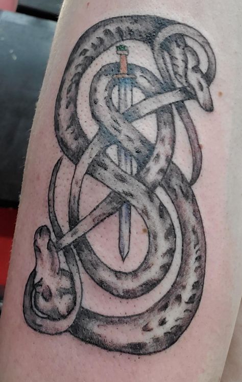 My newest tattoo. The serpents intertwined are there symbol of Loki. I added the viking style longsword. #tattoos #tattoo #beauty Loki Symbol Tattoo, Loki Symbol, Small Neck Tattoos, Serpent Tattoo, Prison Tattoos, Symbol Tattoo, R Tattoo, Symbol Tattoos, Viking Style