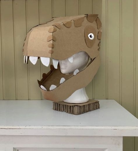 Make your own dinosaur head out of cardboard with this downloadable template. T Rex Cardboard Head, Diy Dinosaur Head, Dino Cardboard, Cardboard Dinosaur Head, Cardboard Dinosaur, Costume Dinosaure, Head Template, Make A Dinosaur, Cardboard Costume