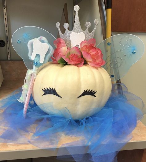 Tooth fairy pumpkin Tooth Pumpkin Decorating, Tooth Pumpkin Carving Ideas, Pumpkin Decorating Contest Dentist, Dental Pumpkin Painting Ideas, Dental Office Pumpkin Ideas, Dental Pumpkin Carving Ideas, Angel Pumpkin Decorating, Pumpkin Painting Ideas Dental, Tooth Fairy Trunk Or Treat Ideas