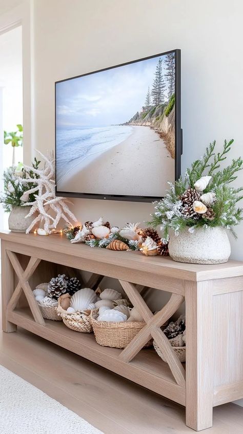 21 Trendy TV Stand Christmas Decor Ideas To Inspire You 18 Tv Stand Christmas Decor Ideas, Tv Stand Christmas, Tv Stand Christmas Decor, Tv Stand Decor Ideas, Moose Silhouette, Glass Tv Stand, Tv Stand Decor, White Lanterns, Shell Decorations