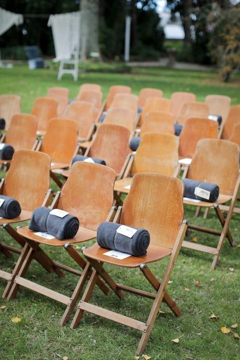 Rolled fleece blankets for guests at the ceremony keeps them warm even after you say I do! Find blankets like these for sale and /or rent at splendorforyourguests.com!  Splendor for Your Guests | Rental Company | Weddings | Events | Shawls | Blankets | Umbrellas | Parasols | Fans Blankets For Guests, Outdoor Wedding Favors, Wedding Reception Guest, Trendy Wedding Favors, Creative Wedding Favors, Inexpensive Wedding Favors, Ceremony Chairs, Edible Wedding Favors, Elegant Wedding Favors