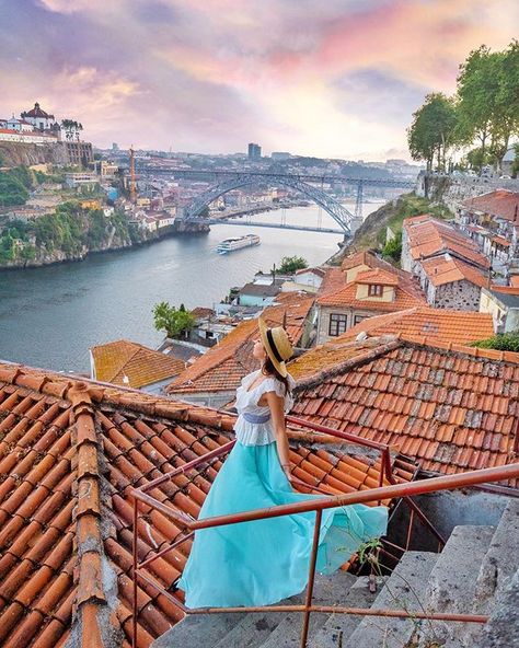 Lifes a Climb but the View is Great  Seeing this stairway to heaven was definitely on my Porto bucket list! One of the best views of the city for sure  Unfortunately our entire time here was rather cloudy so we were never blessed with that much of a gorgeous sunset. So this one is a little bit of movie magic I hope you dont mind since we hiked all the way up here to take this!  A big thanks to @dianamiaus who shared this location on her blog so we were able to find it with ease! Its on Passeio d Cheap European Cities, Jordan Travel, Portuguese Culture, Germany Castles, Cities In Europe, Amazing Photo, Portugal Travel, Get Outdoors, Architecture Old