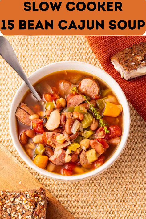 This Slow Cooker 15 Bean Cajun Soup is a super flavorful, hearty crockpot soup recipe that is filling and nutritious. It is easy on your budget and makes plenty of delicious leftovers. Cajun 15 Bean Soup Recipe, Cajun 15 Bean Soup, Cajun Soup, Navy Bean Soup, 15 Bean Soup, Crockpot Soup, Breakfast Soup, Soup Beans, Crockpot Soup Recipes