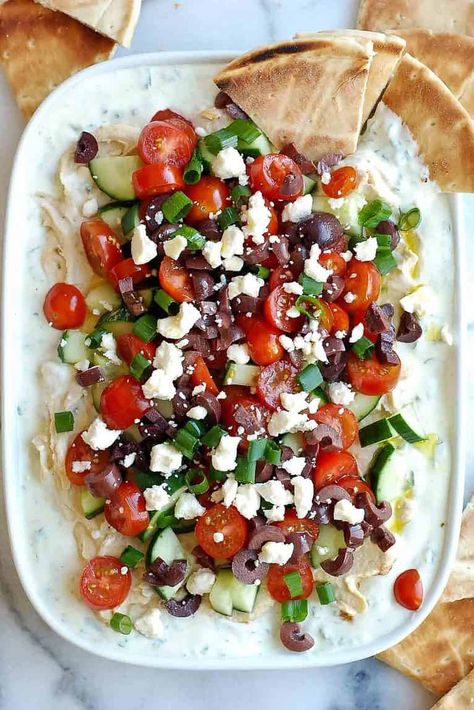 Easy 7 Layer Greek Dip | Front Range Fed 7 Layer Greek Dip, Greek Hummus Dip, Greek Dip Recipes, Greek Layer Dip, Greek Yogurt Dip, Mediterranean Appetizers, Greek Dip, Tomato And Feta, Layered Dip Recipes