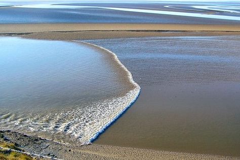 This rare aquatic phenomenon is one of the more accessible tidal bores in Morecambe Bay. Morecambe Bay, Rising Tide, Vitamin Sea, Beautiful Sights, Time Of The Year, England, Travel