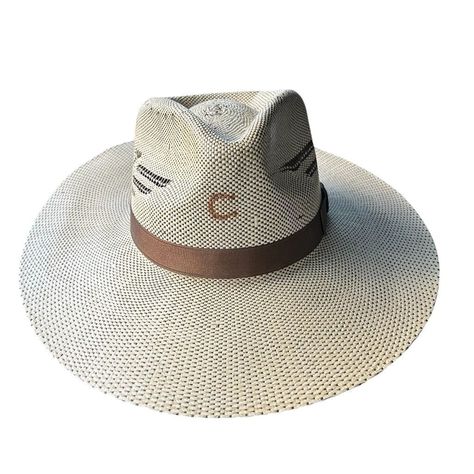 The Charlie 1 Horse Western Straw Hat In A Rich Brown Hue Is Your Perfect Companion For Sun-Soaked Adventures. Its Solid Straw Construction Offers A Lightweight Feel, While The Signature Charlie 1 Horse Branding On The Crown Adds A Touch Of Authentic Western Flair. Ideal For Rodeos, Country Music Festivals, Or Casual Outings, This Hat Is Designed For Unisex Adults Who Appreciate Style And Comfort. With Its Large Size, It Ensures A Comfortable Fit For All-Day Wear. New With Tags (Nwt). Keywords: Horse Branding, Rodeo Hat, Horse Brand, Horse Western, Country Music Festival, Crown Pattern, Horse Accessories, Festival Hat, Brown Hats