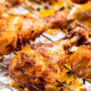 Honey Garlic Chicken Drumsticks - Julie's Eats & Treats ® Honey Garlic Chicken Drumsticks, Honey Soy Sauce Chicken, Chicken Drumstick Recipes Oven, Garlic Chicken Drumsticks, Drumstick Recipes Oven, Easy Baked Chicken Thighs, Baked Honey Garlic Chicken, Easy Honey Garlic Chicken, Party Nibbles