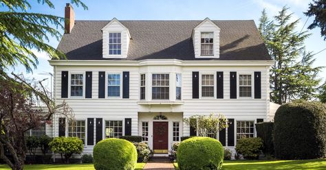 The housing market is in flux heading into prime buying season Colonial House Exterior, Colorful Landscaping, New England Colonial, White Colonial, Paint Color Ideas, Exterior Paint Color, Brick And Wood, Roof Colors, New England Homes