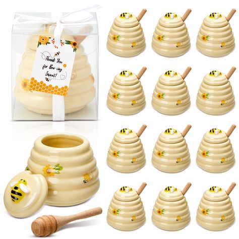 PRICES MAY VARY. Package Include: You will receive 12 pieces bee ceramic honey pot with wood dippers and lids from our package, you can use them to store your honey and share them with your friends, the enough quantity can meet your demands well Size Information: Our ceramic honey jar measures 7.6 x 6.9 cm/ 3 x 2.7 inches, come with a small honey wood dipper makes this pot instantly adorable. The size make the ceramic honey pot looks delicate and compact, it can be sent to your friends and famil Honey Party Favors, Honey Party, Baby Shower Favors For Guests, Bee Party Favors, Baby Shower Favours For Guests, Honey Bee Baby Shower, Bee Theme Party, Honey Jars, Disney Baby Shower