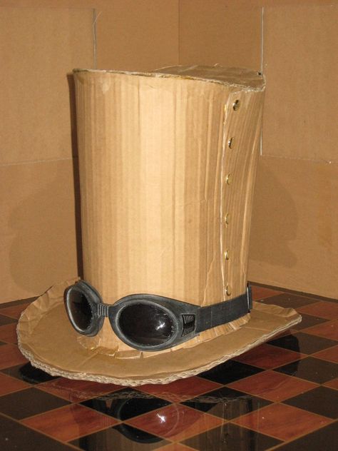 This is the cardboard top hat I built to be worn with the steampunk version of my giant cardboard robot suit. I'm quite pleased with how it turned out. ... Cardboard Top Hat Cardboard Top Hat, Cardboard Costumes, Steampunk Birthday, Cardboard Robot, Cardboard Costume, Technical Theatre, Diy Hats, Robot Suit, Steampunk Top