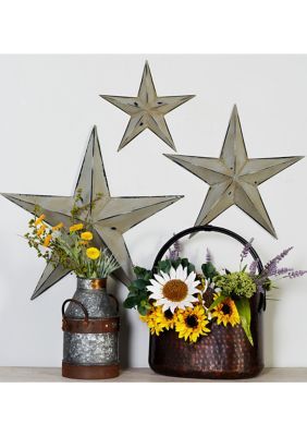 Enhance your farmhouse inspired home with classic style and a touch of cozy appeal. Celestial wall decor is made of a solid iron for durability. Features a 3 piece wall star decor that has dimensional design each white tone and distressed black outline finish. This 3-in-1 star wall decor set features a 2-dimensional design with decorative distressing. This item measures 24L x 4W x 24H, 18L x 3W x 18H, 12L x 2W x 12H inches, and weighs 5.15 lbs | Monroe Lane Farmhouse Metal Wall Decor - Set Of 3, Rustic Outdoor Wall Decor, Metal Stars Decor, Star Wall Decor, Windmill Wall Decor, Feather Wall Decor, Stars Wall Decor, Wall Decor Lights, Star Wall Art, Metal Star