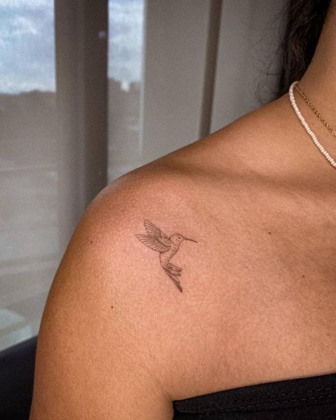 Humming Bird Collar Bone Tattoo, Ankle Tattoo Hummingbird, Hummingbird Olive Branch Tattoo, Dainty Tattoo Sayings, Hummingbird Tattoo Back Of Neck, Humming Bird Small Tattoo, Hummingbird Linework Tattoo, Aesthetic Wrist Tattoos For Women, Hummingbird Tattoo Location