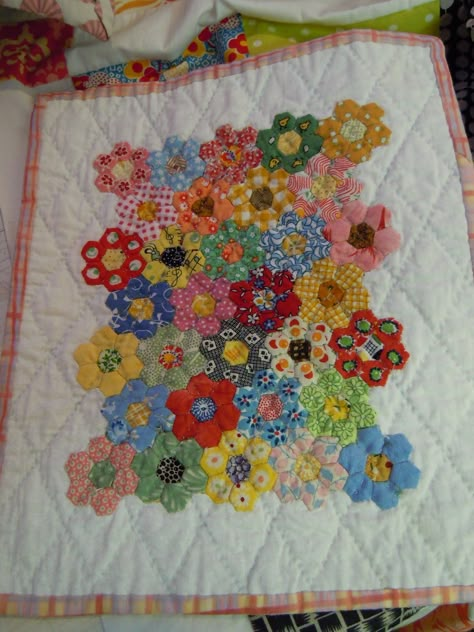 This is a blog for the busy woman who quilts, sews, cooks, decorates, and loves to craft! Grandmothers Garden Epp, Grandma's Garden Quilt Pattern, Hexagon Flower Quilt Patterns, Grandmothers Flower Garden Quilt Pattern Free, Grandma’s Flower Garden Quilt Pattern, Grandmas Flower Garden Quilts, Hexie Quilts Patterns Layout, Grandmothers Flower Garden Quilt Pattern, Hex Quilt