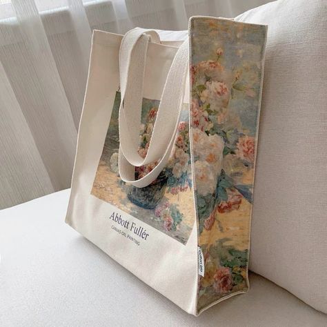 A tote bag depicting "Still Life of Flowers" by Abbott Fuller Graves. Pink and white roses are overflowing from the vase, creating a romantic atmosphere. It is made of thick canvas material and has plenty of storage capacity. Comes with a pocket inside. Pack your computer and your favorite books and head out.       Size     Height: 36cm   Width: 36cm   gusset: 10cm       Material     Thick canvas fabric Elegant Tote Bag, Tote Bag Ideas Design, Gift Bags Ideas, Gift Bag Design, Tote Bag Design Ideas, Creative Tote Bag, Flower Bags, Pink And White Roses, Flowers Tote